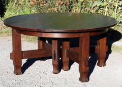 Vintage early 8 leg 60 in stretcher base dining table with 5 leaves opens to 10 ft Stickley era